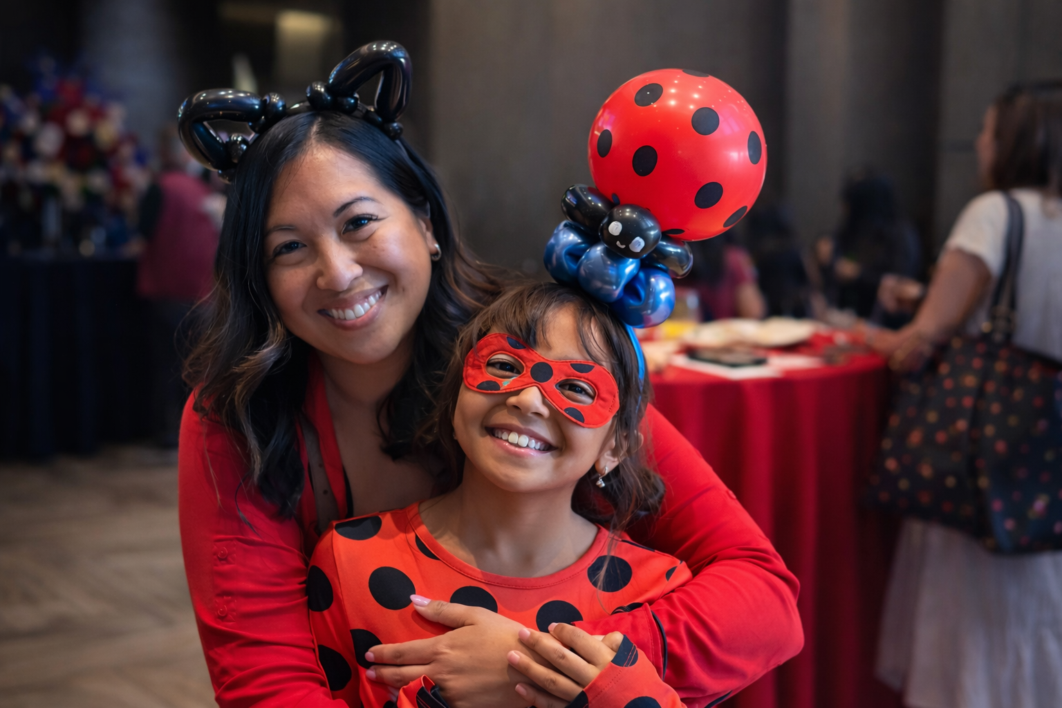 Child wearing ladybug balloon headband at kids party entertainment event in Los Angeles by The Balloon Guy